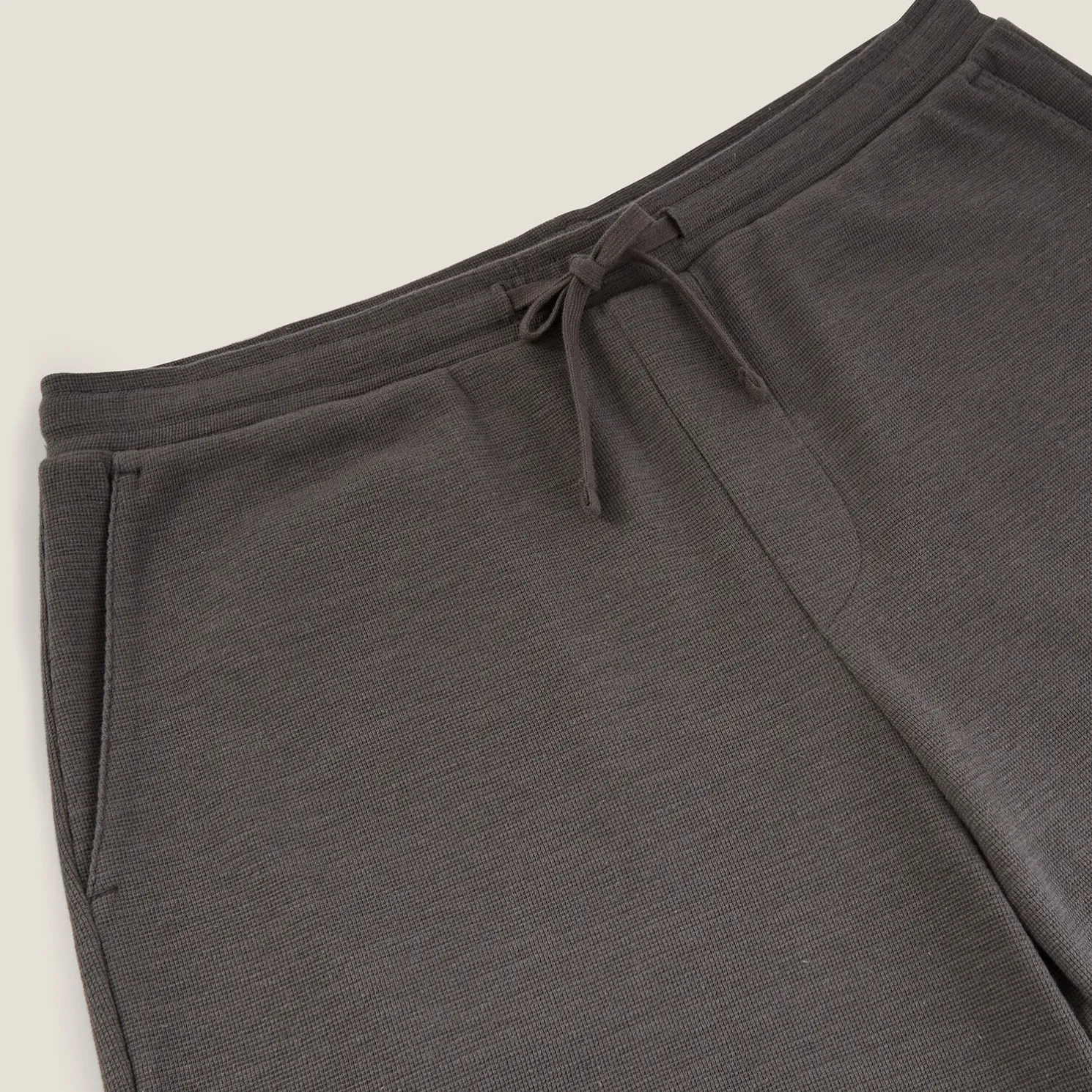 Effen bermuda in textuurstof