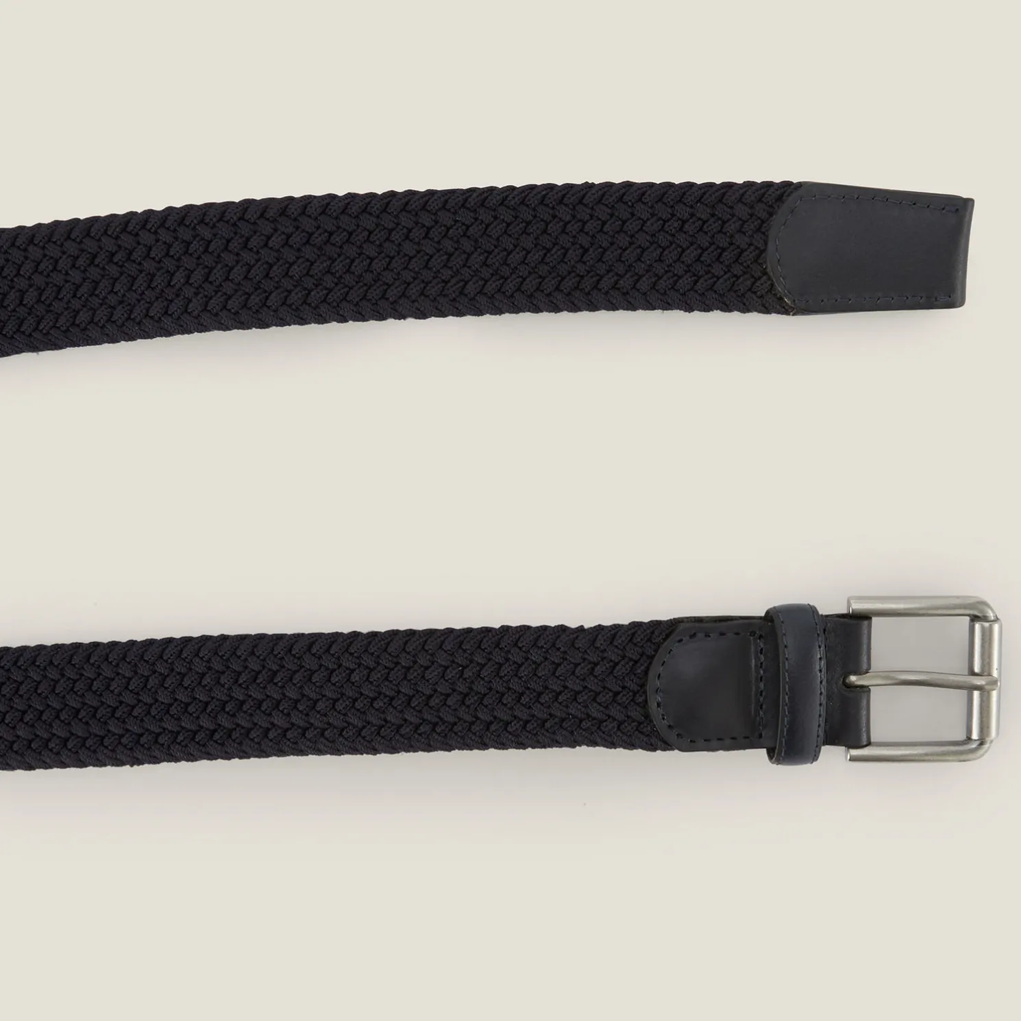 Elastische riem met rolgesp
