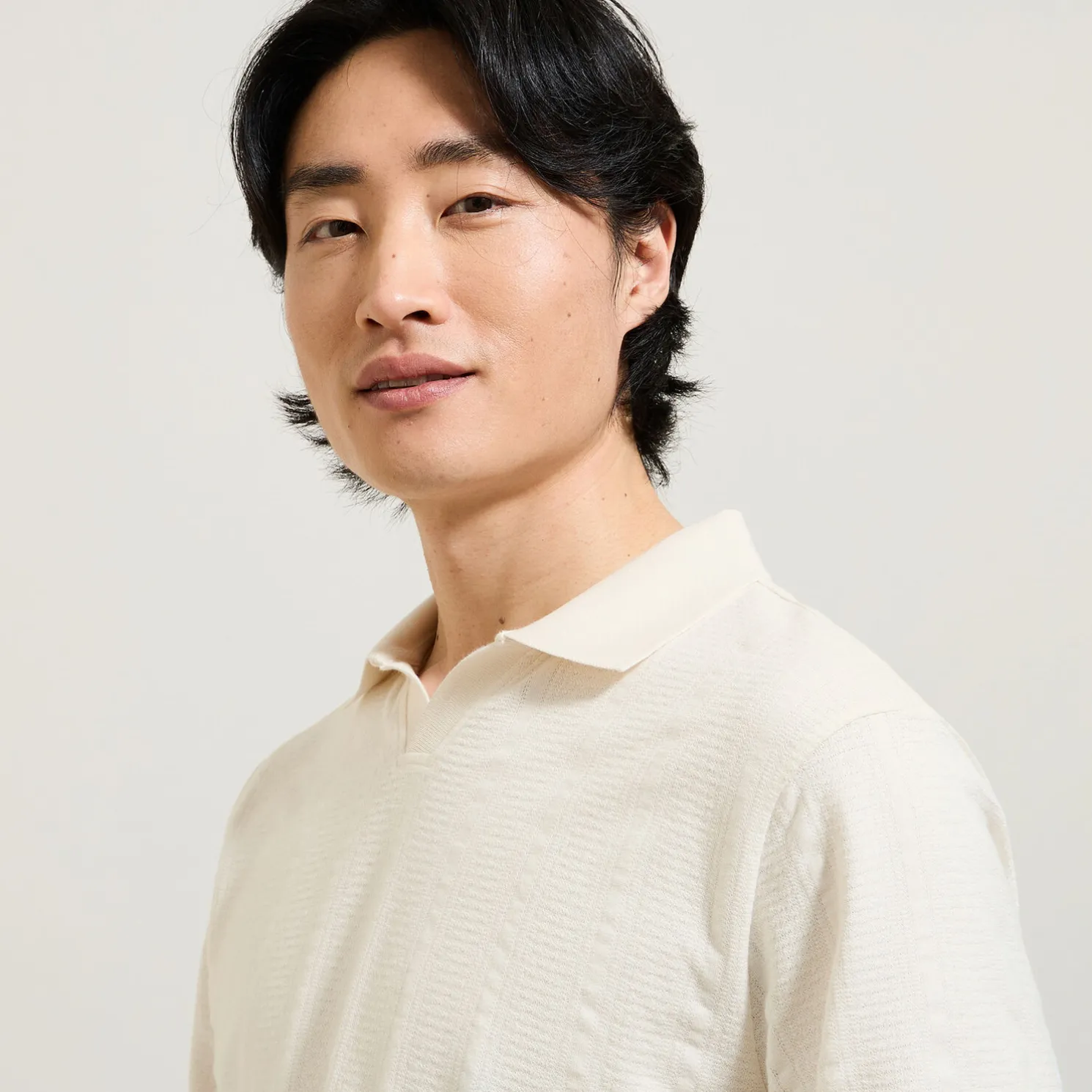 Polo in textuurstof met korte mouwen en resortkraa