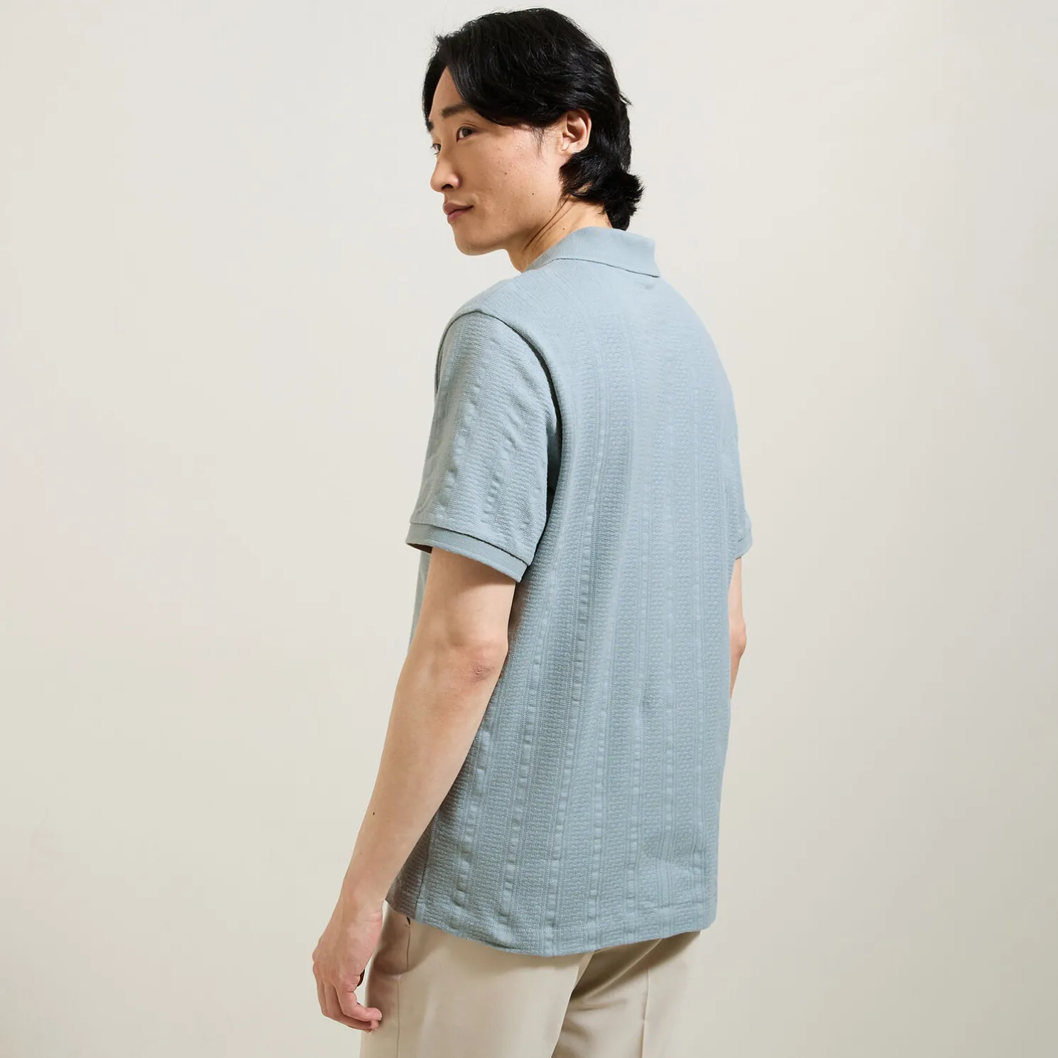 Polo in textuurstof met korte mouwen en resortkraa